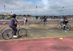 A cycle lesson - 4 women cycling
