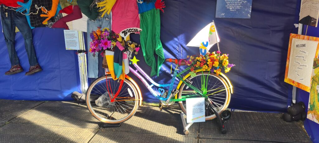 On Yer Bike image containing a decorated bike and textile and other arts display